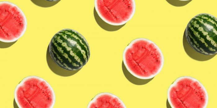 pattern with ripe watermelon on yellow background pop art design, creative summer concept banner half of watermelon in mi...